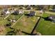 Aerial view of a home with a large lot that is surrounded by a privacy fence at 1036 Butterfly Cir, Wake Forest, NC 27587