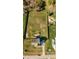 Aerial view of a home surrounded by a fenced-in yard with a patio area at 1036 Butterfly Cir, Wake Forest, NC 27587