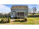 Large backyard showcasing a patio, grilling area, and privacy fence at 1036 Butterfly Cir, Wake Forest, NC 27587