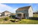 Expansive backyard featuring a patio, lush lawn, a screened-in porch and privacy fence at 1036 Butterfly Cir, Wake Forest, NC 27587