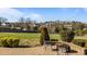 Brick patio overlooks a large, green backyard at 1036 Butterfly Cir, Wake Forest, NC 27587