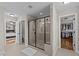 Bathroom with a large shower stall, access to water closet, and a walk-in closet at 1036 Butterfly Cir, Wake Forest, NC 27587
