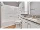 Bathroom featuring granite counters and white fixtures at 105 Seminole Dr, Wendell, NC 27591