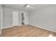 Bedroom boasts wood-look floors, neutral paint, and an ensuite bathroom at 105 Seminole Dr, Wendell, NC 27591