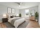 Serene bedroom features neutral decor, natural light, and hardwood floors at 105 Seminole Dr, Wendell, NC 27591