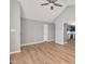 Open living area with vaulted ceiling, wood-look flooring, and seamless transition to the kitchen at 105 Seminole Dr, Wendell, NC 27591