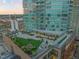 Beautiful aerial view highlights the rooftop terrace and modern building facade at 110 N Corcoran St # 2302, Durham, NC 27701