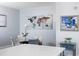 Bright dining area with modern table, chairs and artwork at 110 N Corcoran St # 2302, Durham, NC 27701