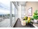 Inviting lounge area with comfortable seating and large windows offering city views at 110 N Corcoran St # 2302, Durham, NC 27701