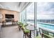 Modern rooftop pool area with comfortable lounge seating and a beautiful city view at 110 N Corcoran St # 2302, Durham, NC 27701