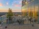 Stylish rooftop patio features comfortable seating areas and panoramic city views at 110 N Corcoran St # 2302, Durham, NC 27701