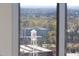 A view of the city from a window with the Lucky Strike water tower in the foreground at 110 N Corcoran St # 2302, Durham, NC 27701