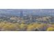 Scenic view overlooking a dense forest with Duke Chapel nestled among the trees during spring with budding leaves at 110 N Corcoran St # 2302, Durham, NC 27701