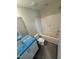 Bathroom with a tub/shower combo and vanity, under construction with protective covering at 1105 Brookrun Dr, Oxford, NC 27565