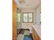 Modern bathroom featuring a glass-enclosed shower and ample natural light at 111 Standing Rock Rd, Chapel Hill, NC 27516