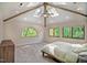 Bright bedroom features a vaulted ceiling, skylights, and large windows at 111 Standing Rock Rd, Chapel Hill, NC 27516