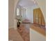 Charming foyer with tile floors, arched doorways, and a welcoming plant, creating a warm and inviting entrance at 111 Standing Rock Rd, Chapel Hill, NC 27516