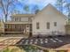 Rear exterior view of home with covered deck, porch, and landscaped yard at 117 Pierce Rd, Garner, NC 27529