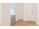 Hallway showcasing wood flooring at 1204 Pecan Pl, Durham, NC 27704