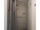 Tiled shower with rainfall shower head and a built-in niche at 1204 Pecan Pl, Durham, NC 27704