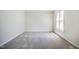 Spacious bedroom featuring neutral carpet and ample natural light at 121 Westview Dr # 43, Carrboro, NC 27510