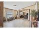Spacious living room with open layout, modern flooring, and natural light from large windows at 122 Blueberry Dr, Selma, NC 27576