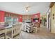 Open-concept living area with a fireplace, dining space, and seamless flow to the kitchen at 122 Blueberry Dr, Selma, NC 27576
