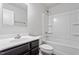 Bathroom with a tub, shower, and a modern vanity creating a functional and clean space at 1423 Bridgewater Dr, Durham, NC 27704