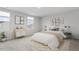 A tastefully staged bedroom featuring natural light, complemented by stylish decor and furnishings at 1423 Bridgewater Dr, Durham, NC 27704