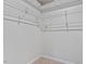 Organized walk-in closet with adjustable shelving, providing ample storage space at 1423 Bridgewater Dr, Durham, NC 27704