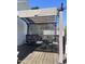 Comfortable back deck featuring sun shade and outdoor seating area at 1721 Daniels Farm Rd, Mebane, NC 27302