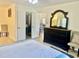 Bedroom featuring a closet and tile flooring at 1721 Daniels Farm Rd, Mebane, NC 27302