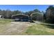 Multiple carports offer ample covered parking for vehicles and equipment at 1721 Daniels Farm Rd, Mebane, NC 27302