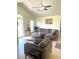 Relaxing living room showcases contemporary furniture, vaulted ceilings, and ample natural light at 1721 Daniels Farm Rd, Mebane, NC 27302