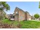 Brick two story home with green backyard and three car garage at 1808 Pattersons Mill Rd, Durham, NC 27703