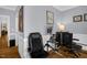 This office features a work desk, a comfortable chair, and access to an adjacent room at 1808 Pattersons Mill Rd, Durham, NC 27703
