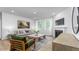 Spacious living area has an electric fireplace, and is decorated with stylish furniture and neutral color palette at 1914 Malvina Ct, Graham, NC 27253