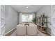 Bright home office with a large window and stylish decor perfect for productivity and comfort at 1914 Malvina Ct, Graham, NC 27253