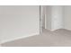 Bright bedroom with plush carpet and natural light with views of other rooms at 1917 Malvina Ct, Graham, NC 27253