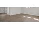 Bright living room featuring durable wood-look flooring and abundant natural light at 1917 Malvina Ct, Graham, NC 27253