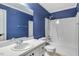 Cozy bathroom with modern fixtures, stylish vanity, shower, and commode at 198 Hillsdale Dr, Archer Lodge, NC 27527