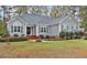 Home's exterior features lovely landscaping, roof, and well-maintained lawn at 198 Hillsdale Dr, Archer Lodge, NC 27527