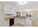 Bright kitchen features plentiful cabinetry, eat-in breakfast nook, and convenient dishwasher at 198 Hillsdale Dr, Archer Lodge, NC 27527