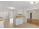 Inviting living room with hardwood floors and white trim features an open layout with kitchen access at 198 Hillsdale Dr, Archer Lodge, NC 27527