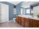 Bathroom featuring a vanity, mirror, shelving, toilet, and shower at 2 Bolter Ct, Durham, NC 27704