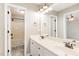 Bathroom featuring a double sink vanity and a shower/tub combo at 201 Alice Dr, Garner, NC 27529