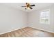 Bedroom featuring neutral walls, carpet, a ceiling fan, and a window at 201 Alice Dr, Garner, NC 27529