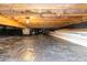 Crawl space with a vapor barrier, insulation, and exposed beams at 201 Alice Dr, Garner, NC 27529