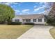Well-maintained home with a long driveway and neat landscaping, offering great curb appeal at 201 Alice Dr, Garner, NC 27529