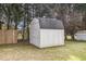 Storage shed in backyard for outdoor equipment and tool storage at 201 Alice Dr, Garner, NC 27529